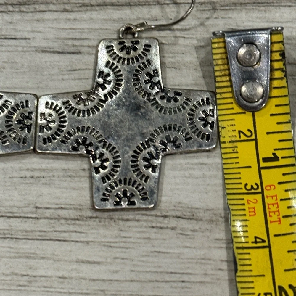 Vintage cross earrings Navajo ,pressed design w/a crystal on back of 1 earring
